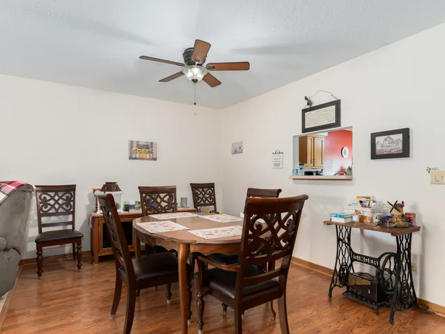 a view of a dining room with furniture