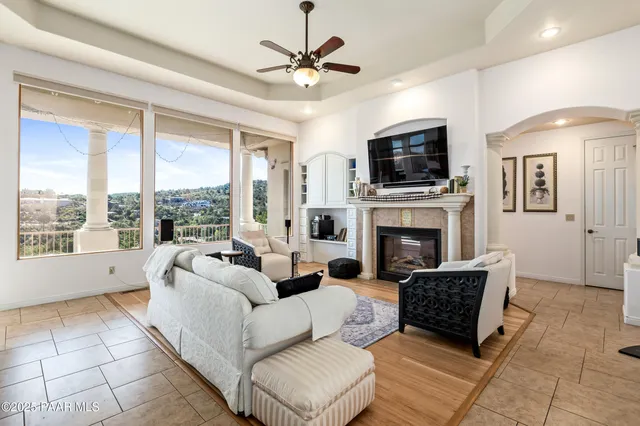 a kitchen with stainless steel appliances kitchen island granite countertop a refrigerator and microwave