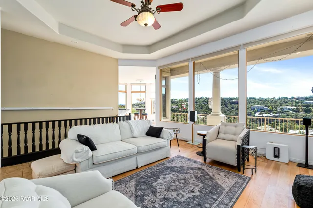 a kitchen with stainless steel appliances granite countertop a sink and a stove