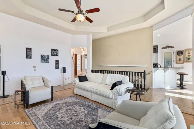 a kitchen with stainless steel appliances a sink stove and cabinets