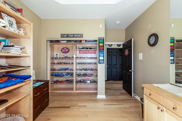 an aerial view of a house with a yard and garden