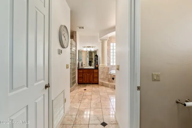a living room with furniture fireplace and a flat screen tv