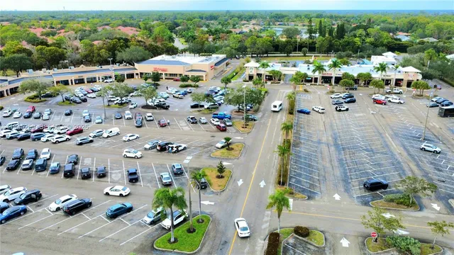 a view of swimming pool with a yard and outdoor seating