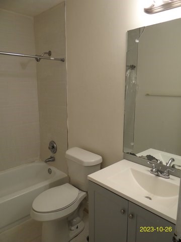 5664 St Marys Road, Unit B Columbus, GA 31907 - Photo 11 of 13 a bathroom with a toilet a sink and a bathtub