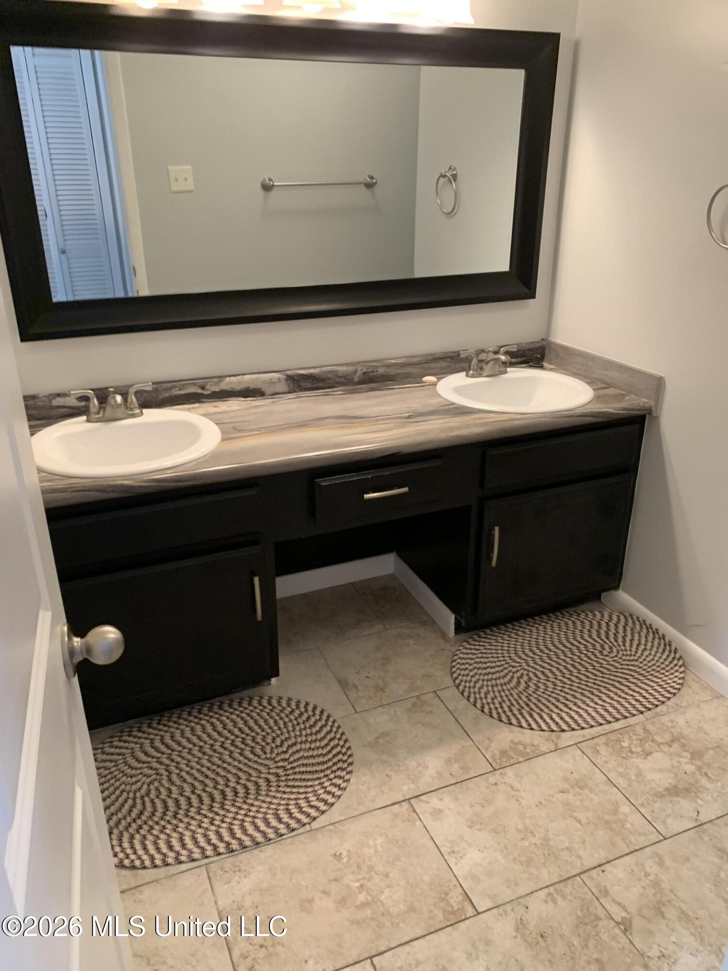 928 Courthouse Road, Unit 38 Gulfport, MS 39507 - Photo 18 of 21 Primary Bathroom Lavatory
