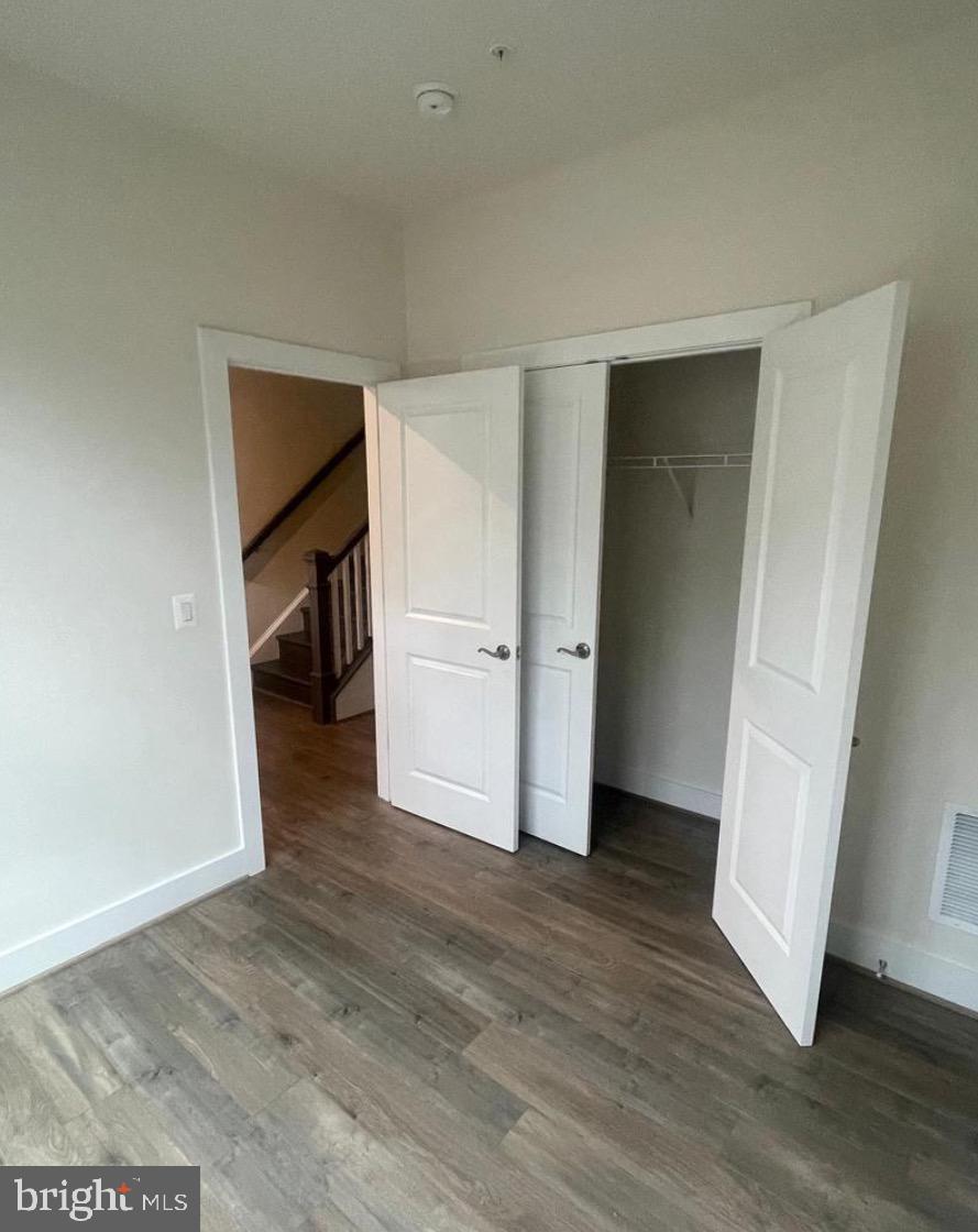 2228 South Glebe Road Arlington, VA 22204 - Photo 24 of 34 a view of a room with wooden floor and a sink
