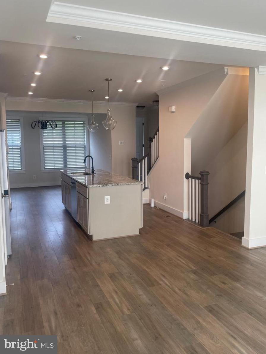 2228 South Glebe Road Arlington, VA 22204 - Photo 9 of 34 a view of a livingroom with furniture wooden floor and staircase