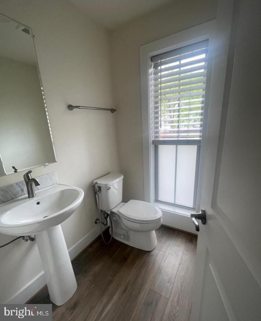 2228 South Glebe Road Arlington, VA 22204 - Photo 10 of 34 a bathroom with a sink and a toilet