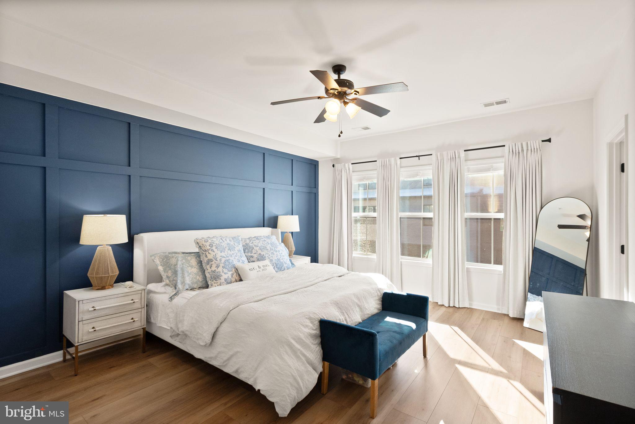 43405 Charitable Street Ashburn, VA 20148 - Photo 18 of 44 a bedroom with a bed and a couch