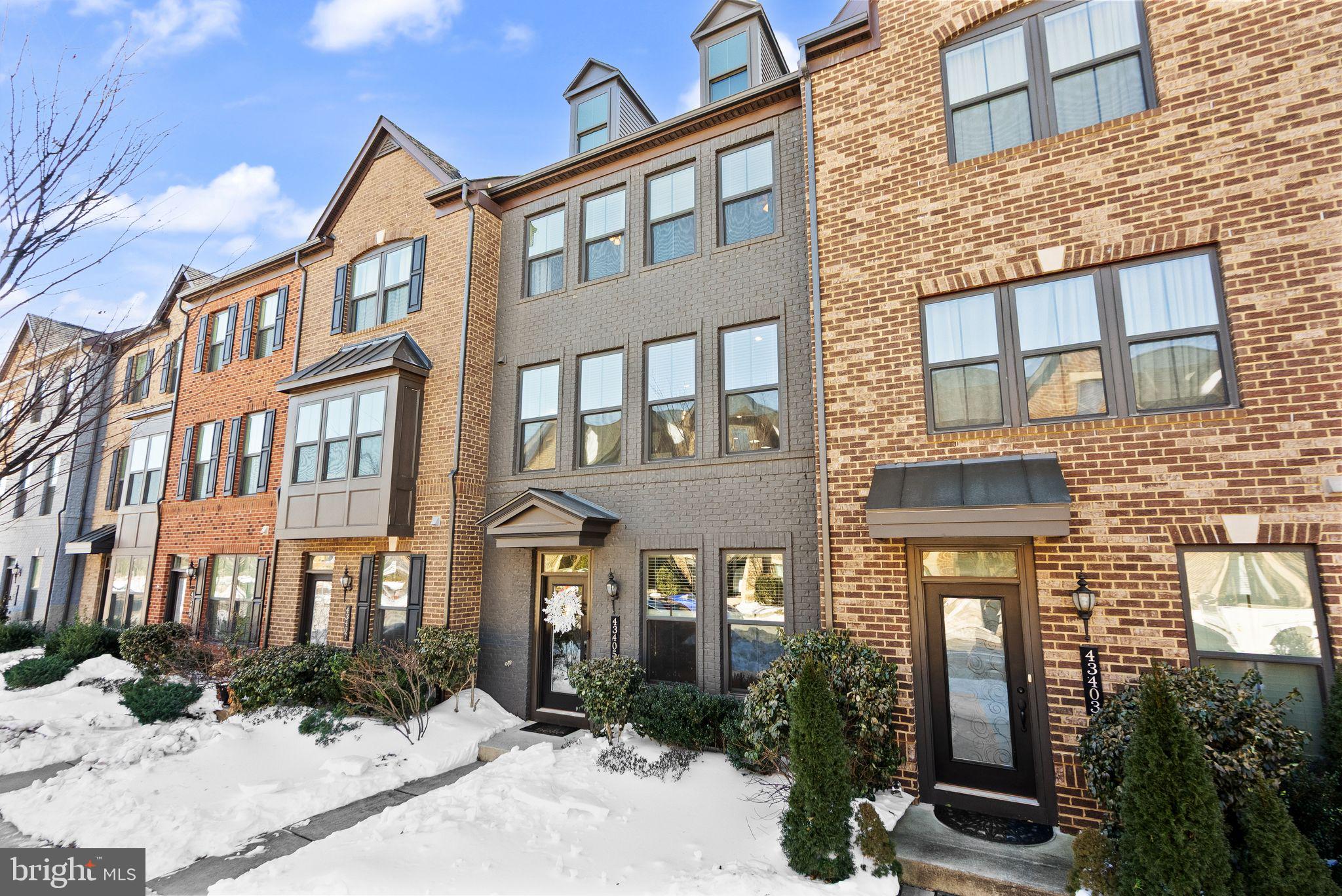 43405 Charitable Street Ashburn, VA 20148 - Photo 2 of 44 a front view of a building