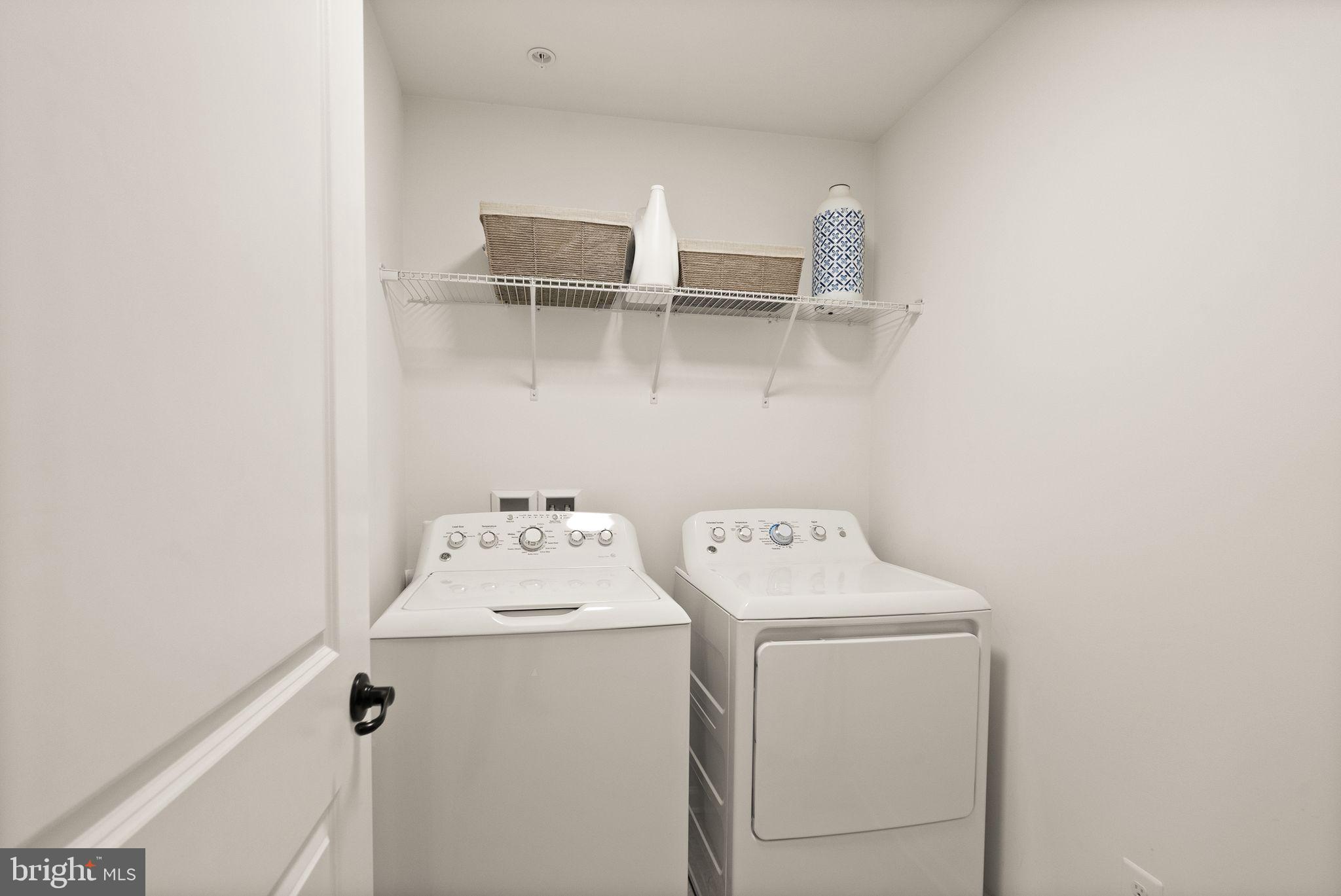 43405 Charitable Street Ashburn, VA 20148 - Photo 28 of 44 a utility room with dryer and washer