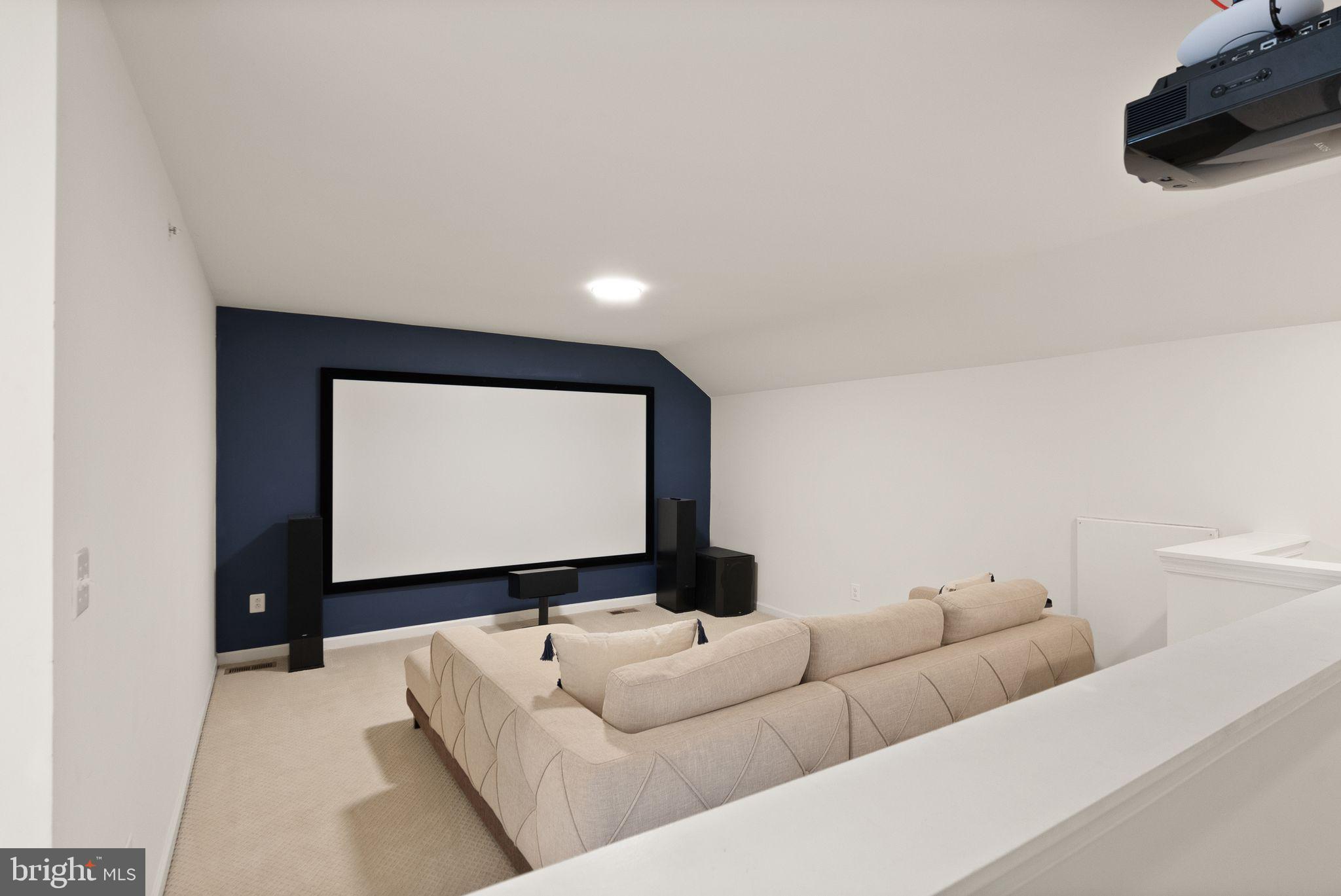43405 Charitable Street Ashburn, VA 20148 - Photo 29 of 44 a living room with furniture and a flat screen tv