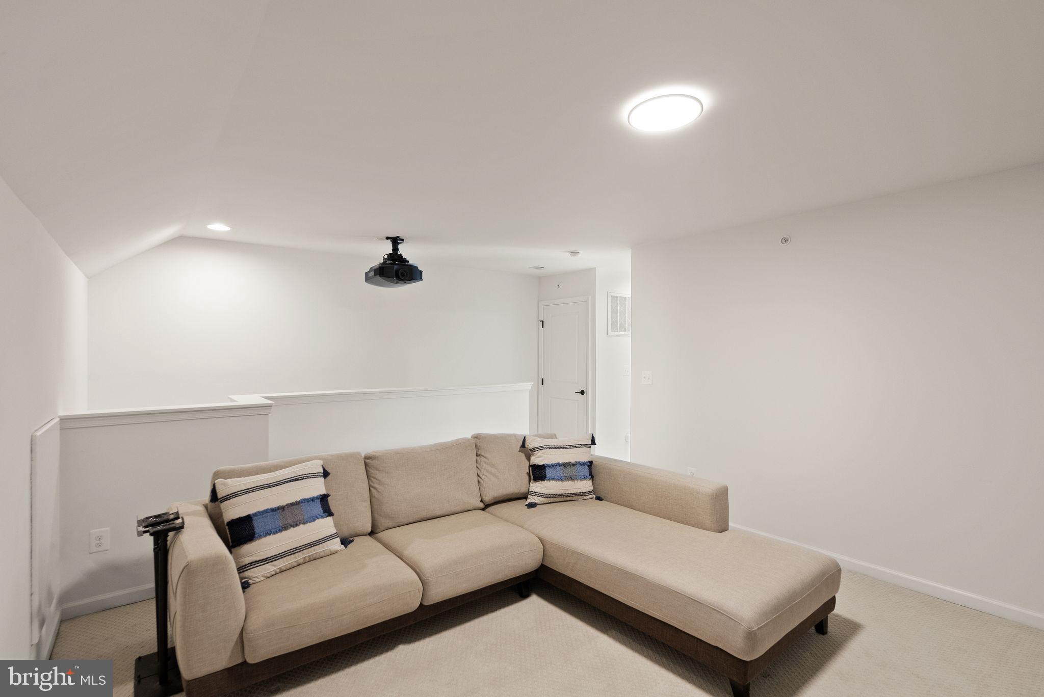 43405 Charitable Street Ashburn, VA 20148 - Photo 30 of 44 a living room with furniture and a window
