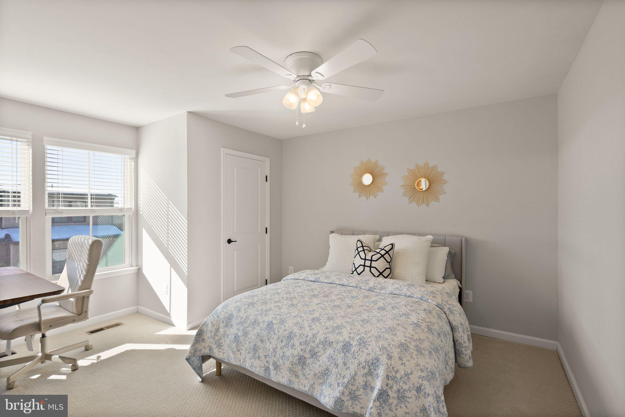 43405 Charitable Street Ashburn, VA 20148 - Photo 31 of 44 a bedroom with a bed and window