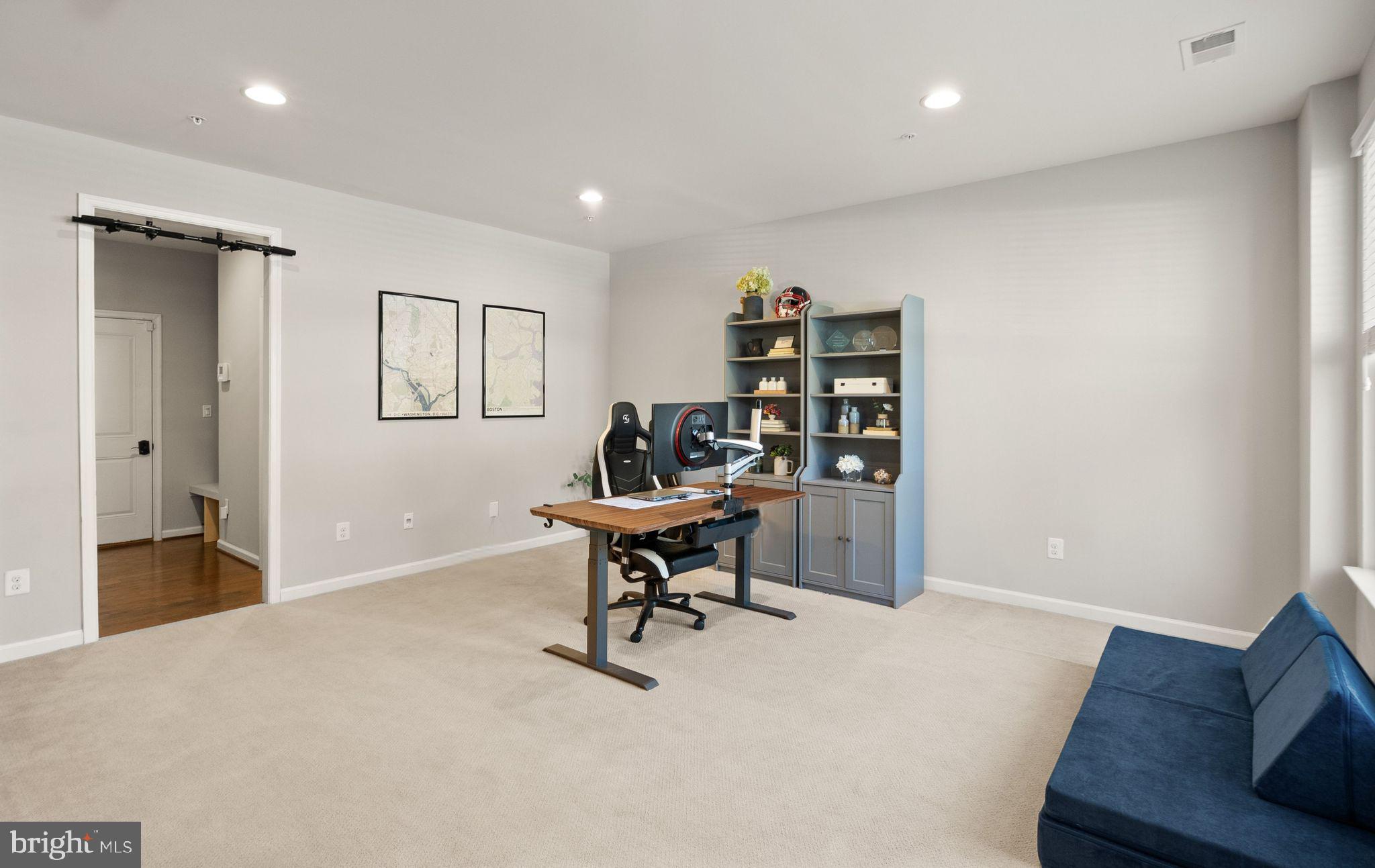 43405 Charitable Street Ashburn, VA 20148 - Photo 6 of 44 a view of a workspace with furniture