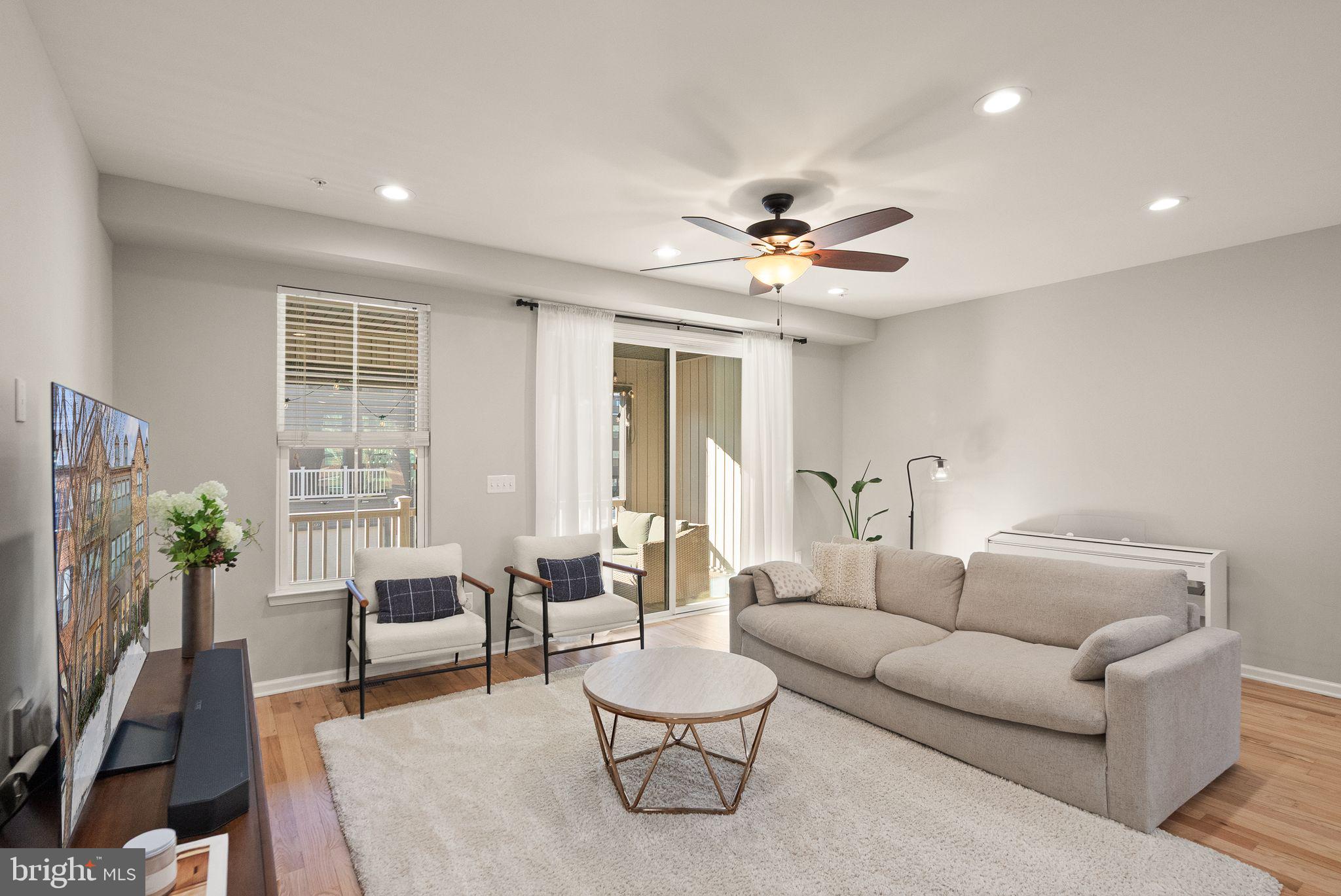 43405 Charitable Street Ashburn, VA 20148 - Photo 10 of 44 a living room with furniture and a large window