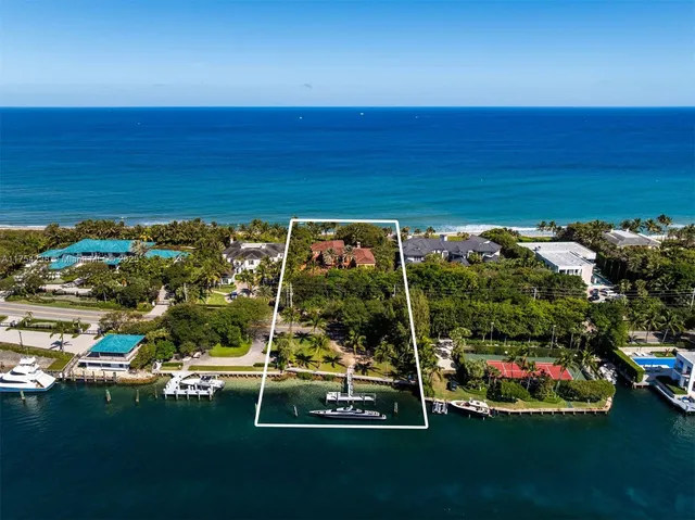 a view of a swimming pool with an outdoor space and seating area