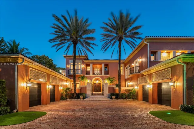 a kitchen with granite countertop a white stove top oven and sink