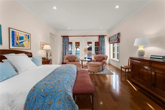 a bedroom with a bed and a table in it