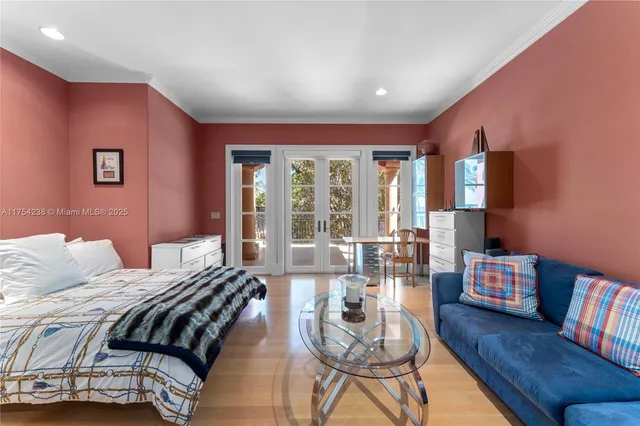 a view of a swimming pool with a table and chairs