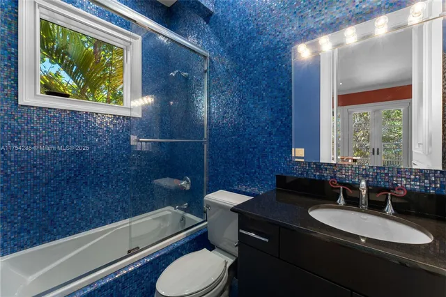 a view of swimming pool with a patio and a yard