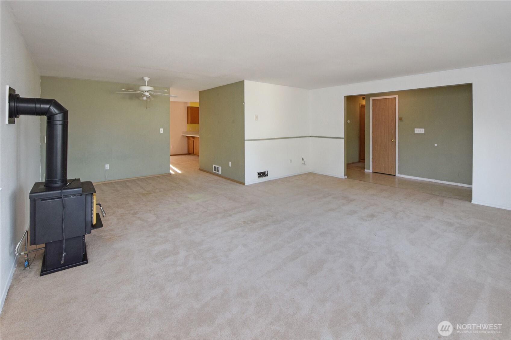 221 East 5th Street Union, WA 98592 - Photo 16 of 32 a view of an empty room with a window