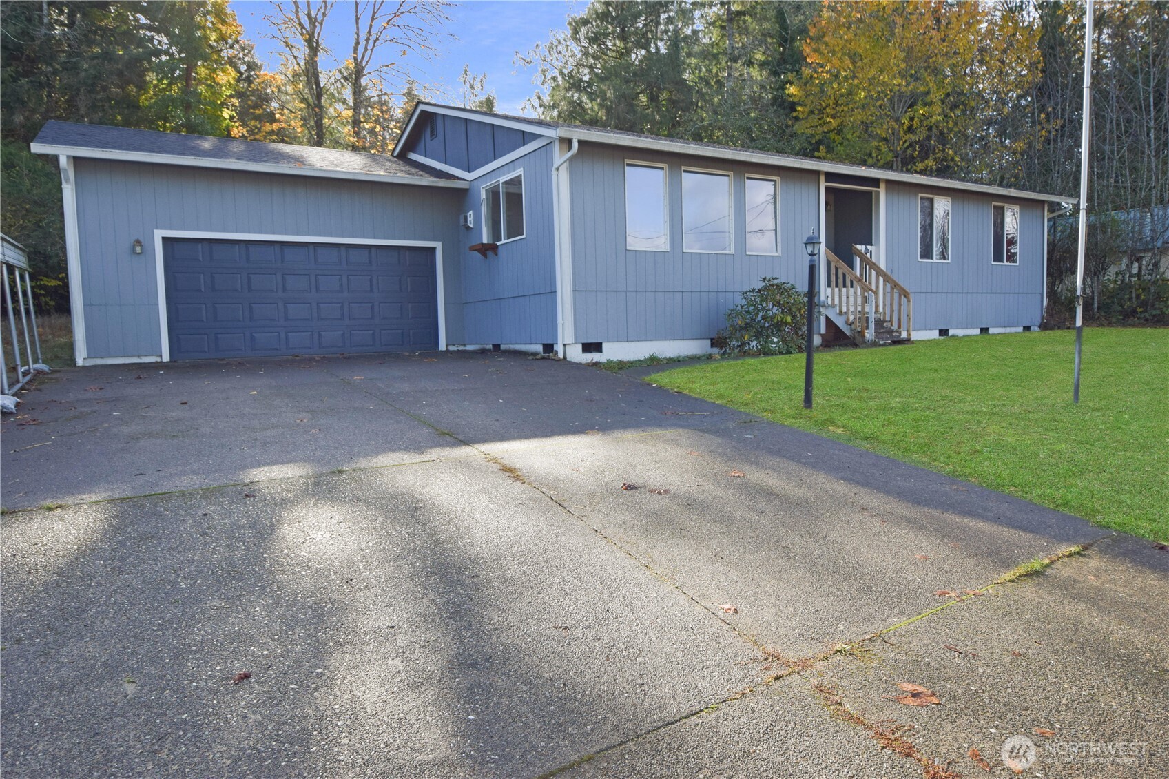 221 East 5th Street Union, WA 98592 - Photo 2 of 32 a front view of house with yard and green space