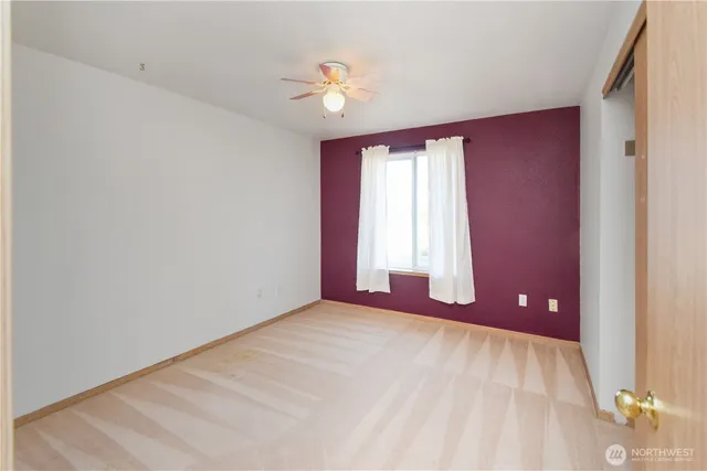 a view of a livingroom with a window