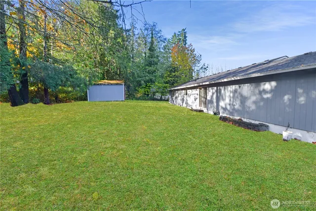 a view of backyard with green space