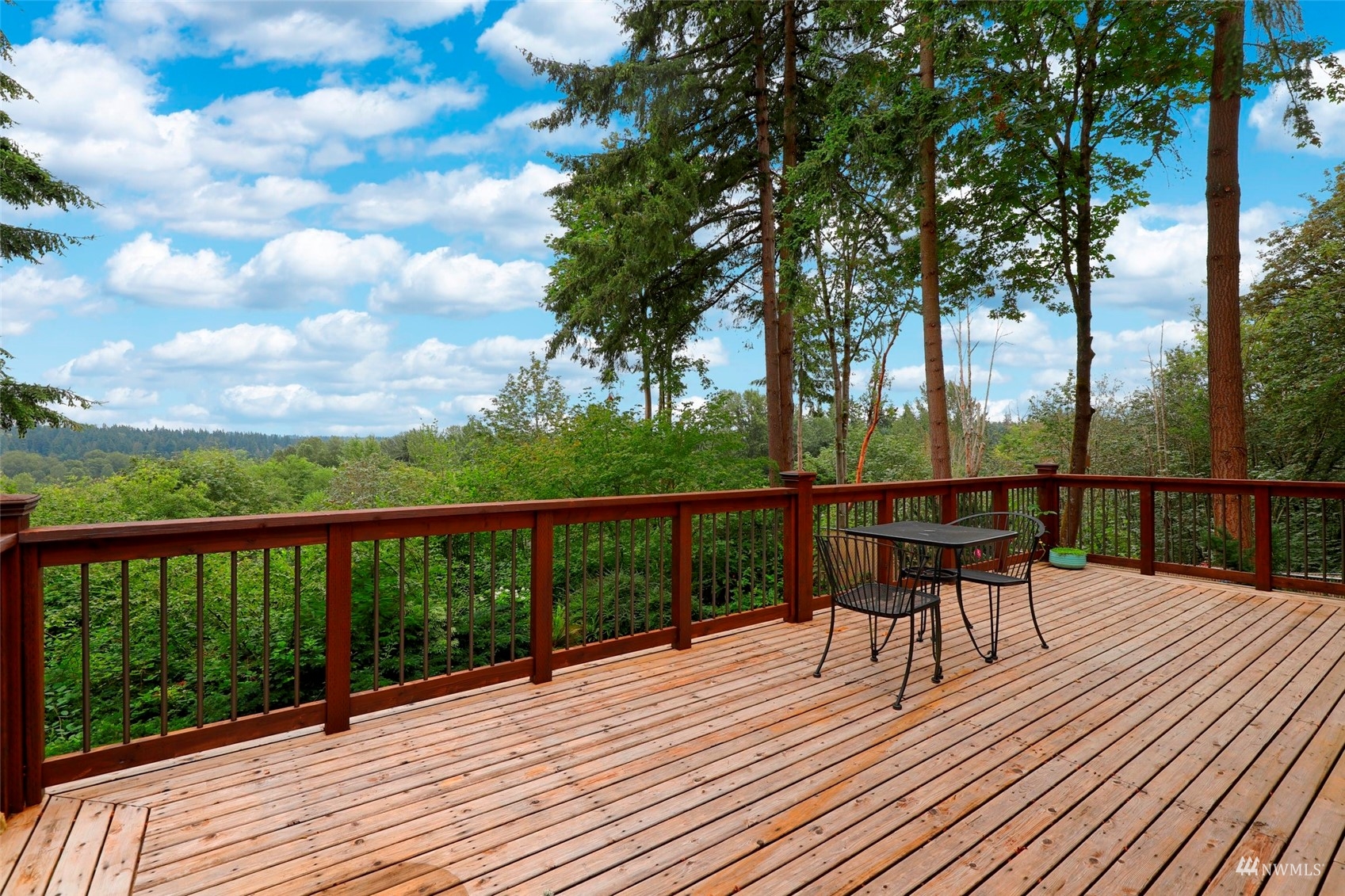 24301 23rd Avenue West Bothell, WA 98021 - Photo 15 of 39 a view of balcony with wooden floor and outdoor seating