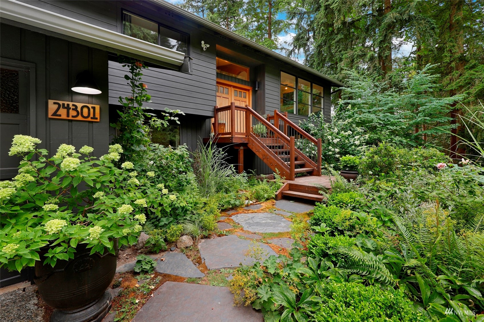 24301 23rd Avenue West Bothell, WA 98021 - Photo 2 of 39 a front view of a house with garden