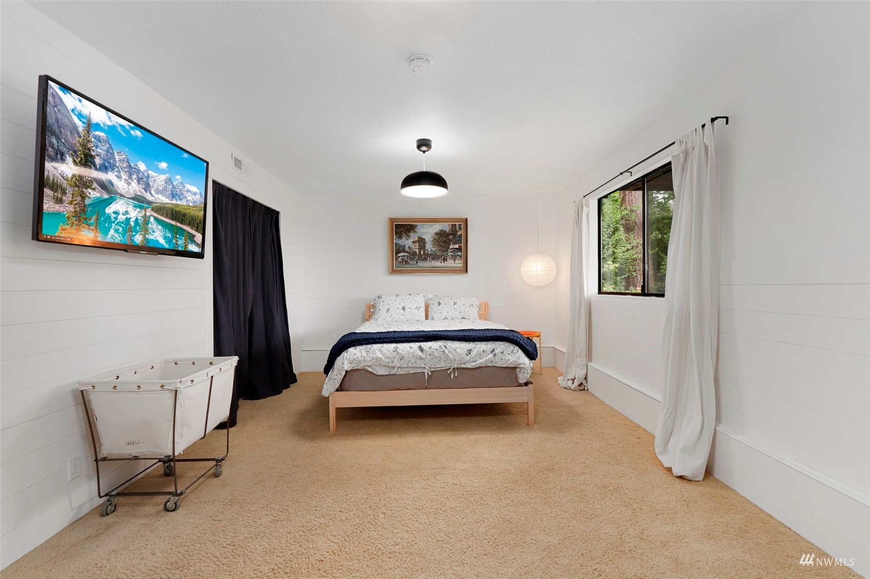 24301 23rd Avenue West Bothell, WA 98021 - Photo 21 of 39 a bedroom with a bed and furniture