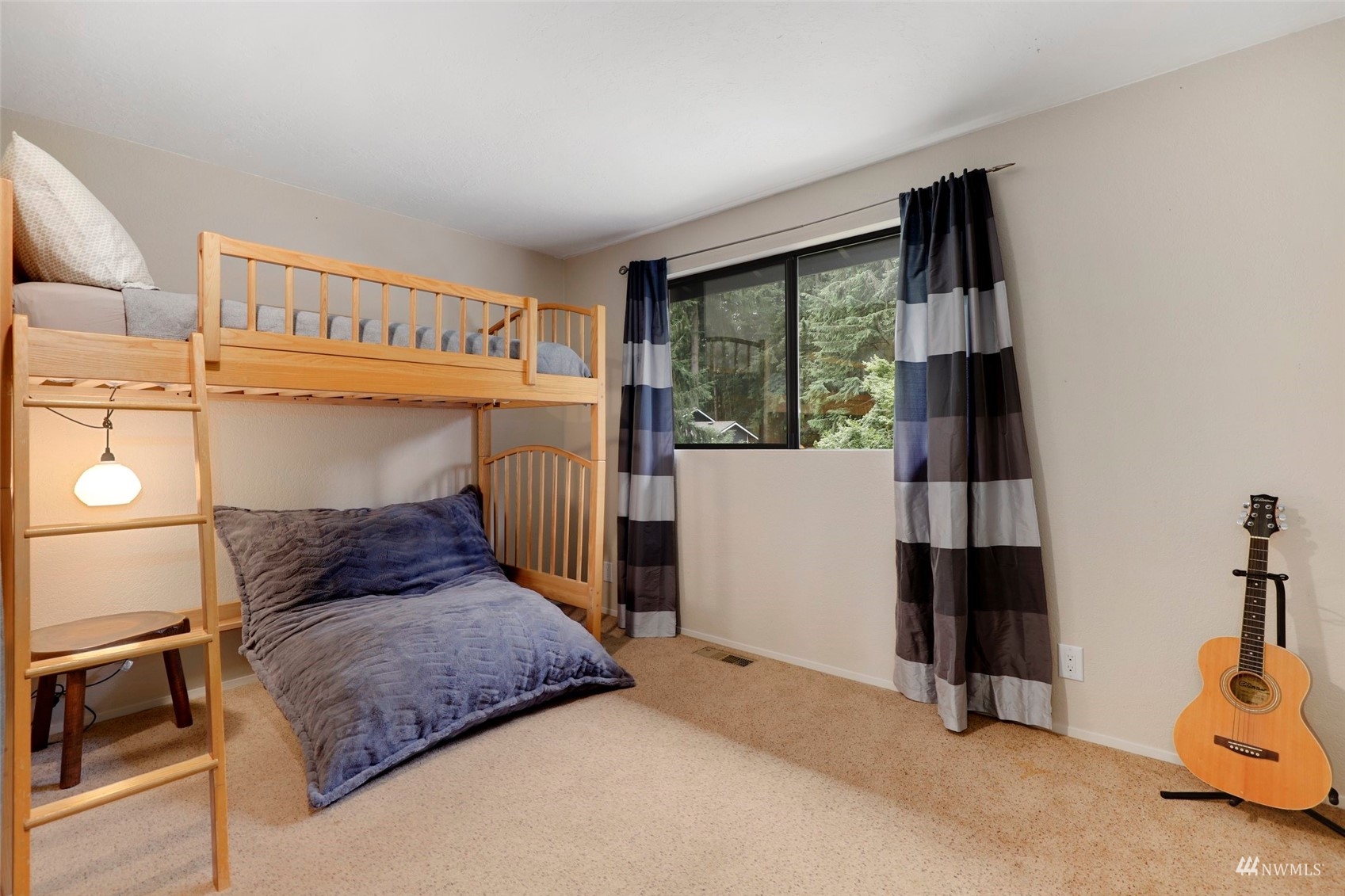 24301 23rd Avenue West Bothell, WA 98021 - Photo 23 of 39 a bedroom with a bed and a window