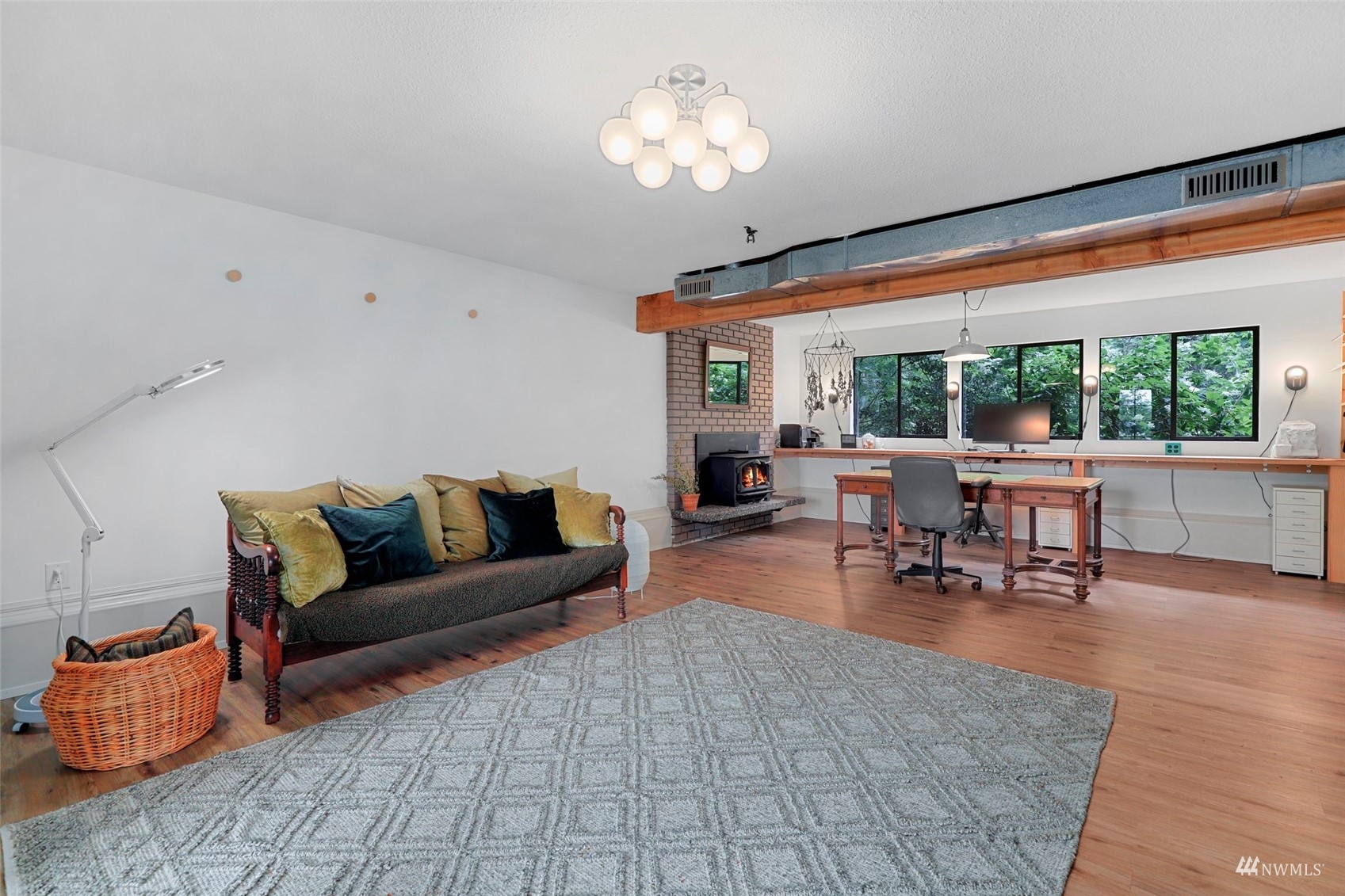 24301 23rd Avenue West Bothell, WA 98021 - Photo 26 of 39 a living room with furniture and a large window
