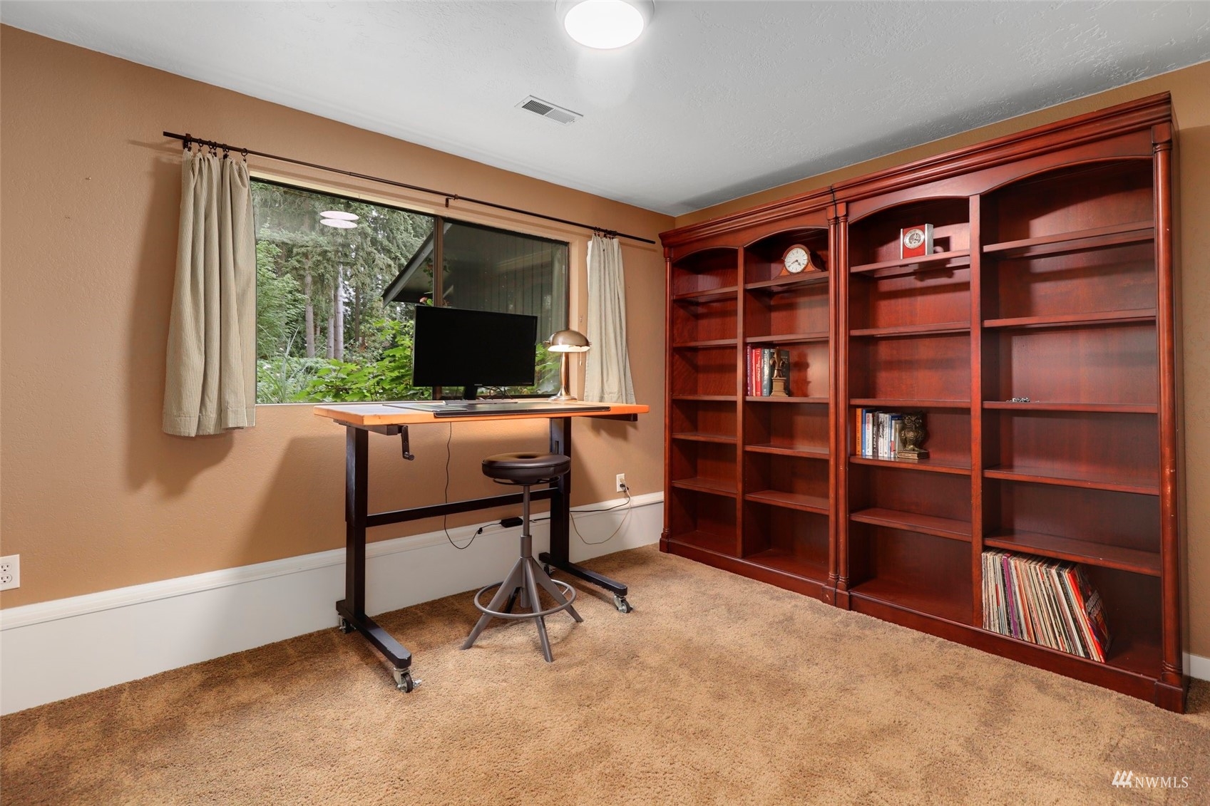 24301 23rd Avenue West Bothell, WA 98021 - Photo 29 of 39 a view of a livingroom with workspace and a window