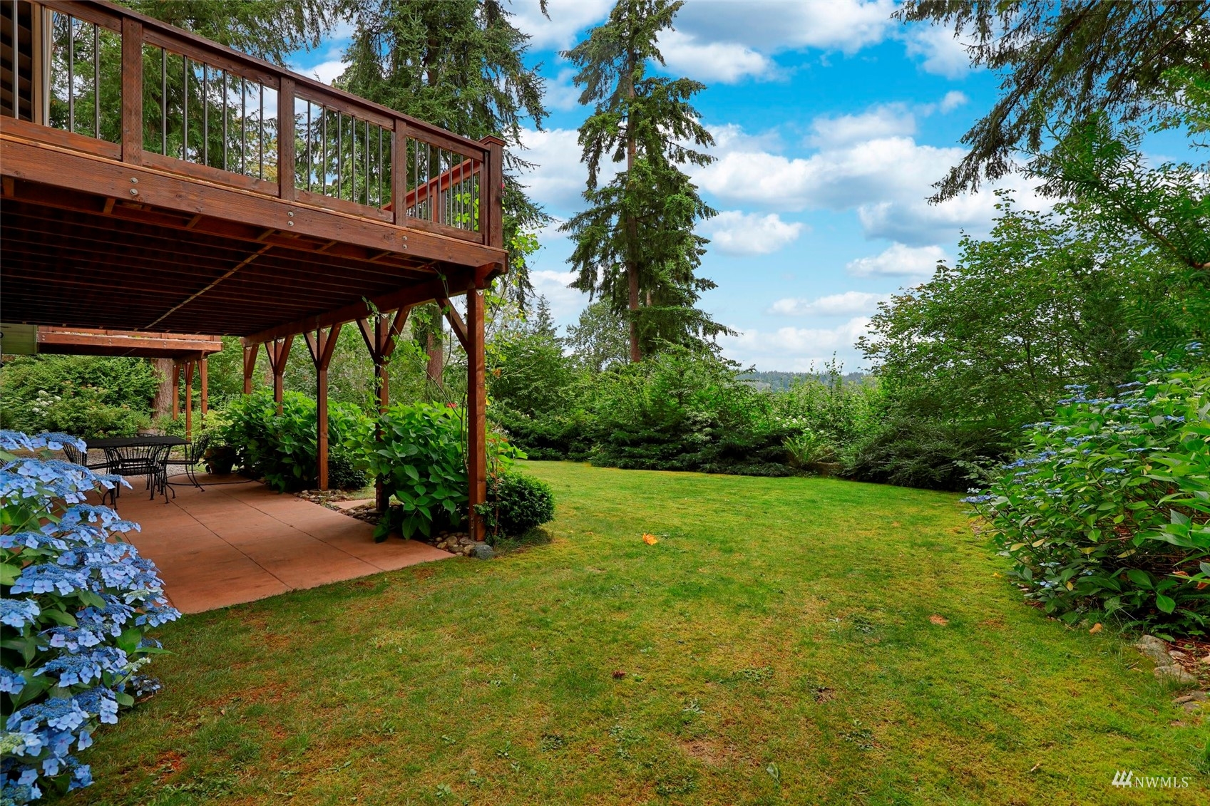 24301 23rd Avenue West Bothell, WA 98021 - Photo 31 of 39 a view of a backyard with a shade house and large tree