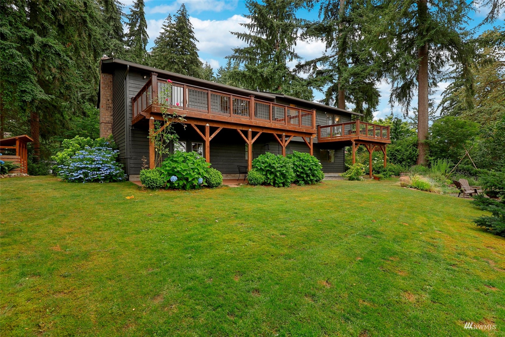 24301 23rd Avenue West Bothell, WA 98021 - Photo 32 of 39 a front view of house with yard and green space