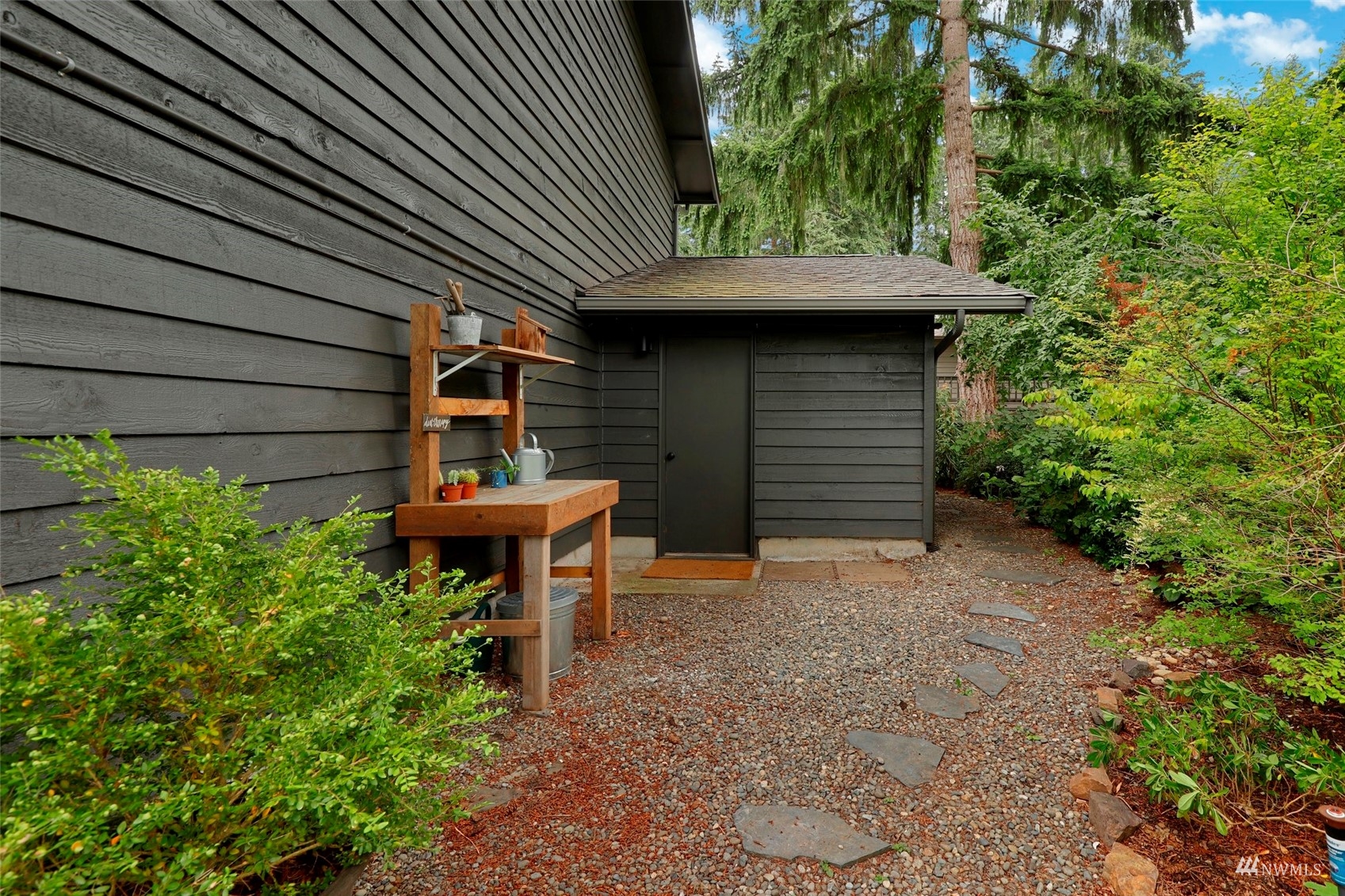 24301 23rd Avenue West Bothell, WA 98021 - Photo 35 of 39 a backyard of a house with table and chairs