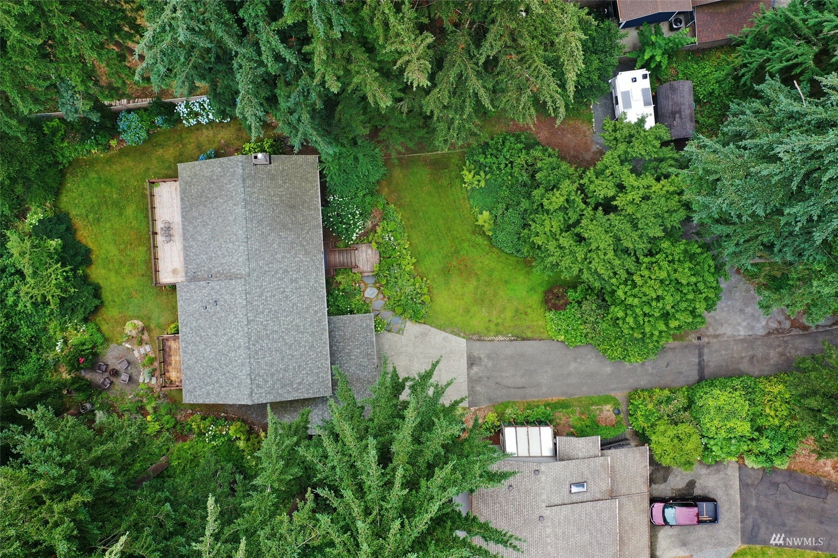 24301 23rd Avenue West Bothell, WA 98021 - Photo 38 of 39 an aerial view of a house with a yard and trees all around