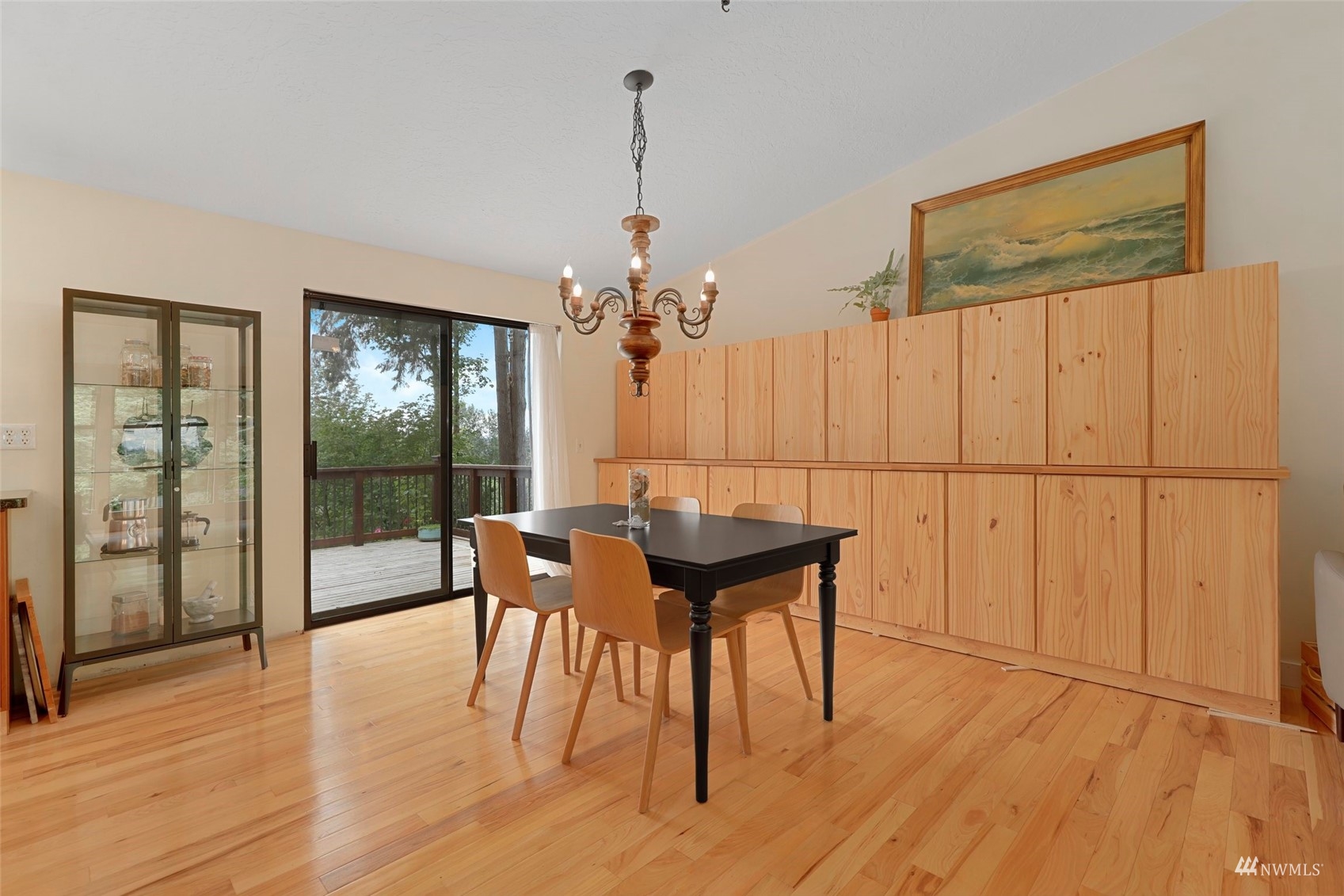 24301 23rd Avenue West Bothell, WA 98021 - Photo 7 of 39 a view of a dining room with furniture window and wooden floor