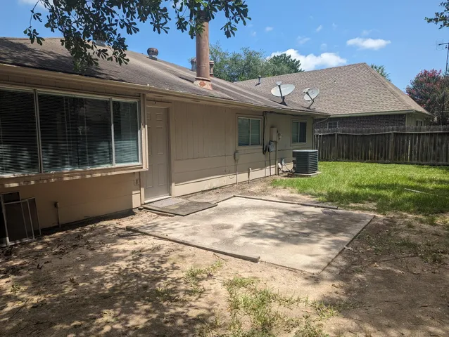 a house with yard in front of it