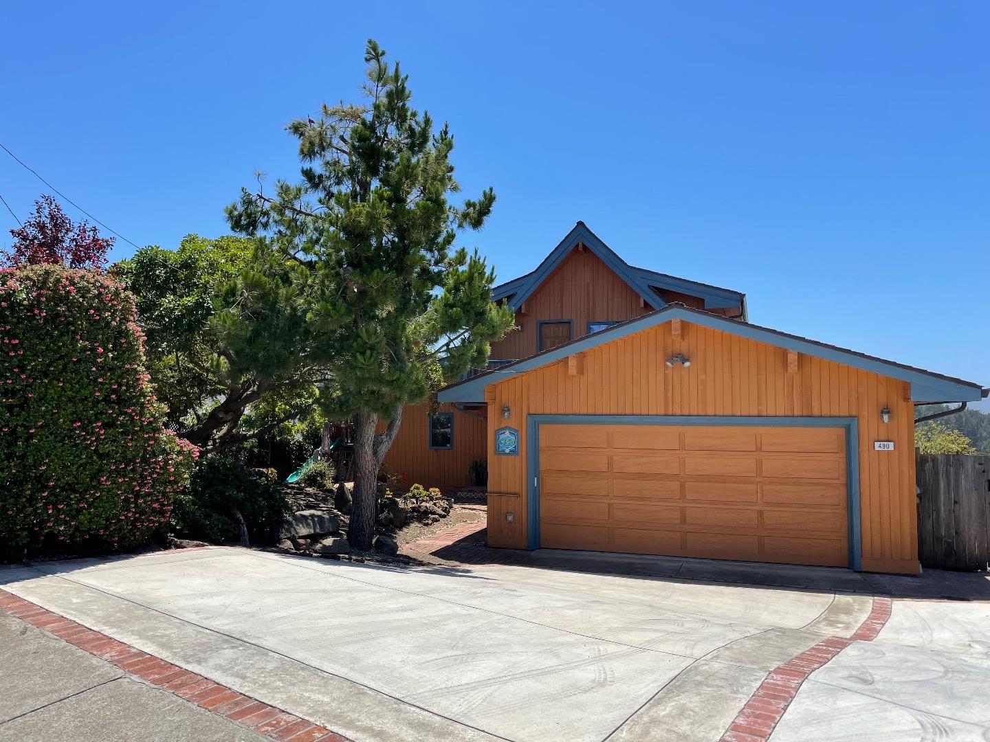 490 Talbot Avenue Pacifica, CA 94044 - Photo 12 of 12 a view of a house with a outdoor space