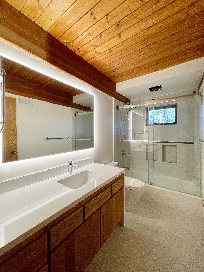 490 Talbot Avenue Pacifica, CA 94044 - Photo 10 of 12 a bathroom with a sink and mirror