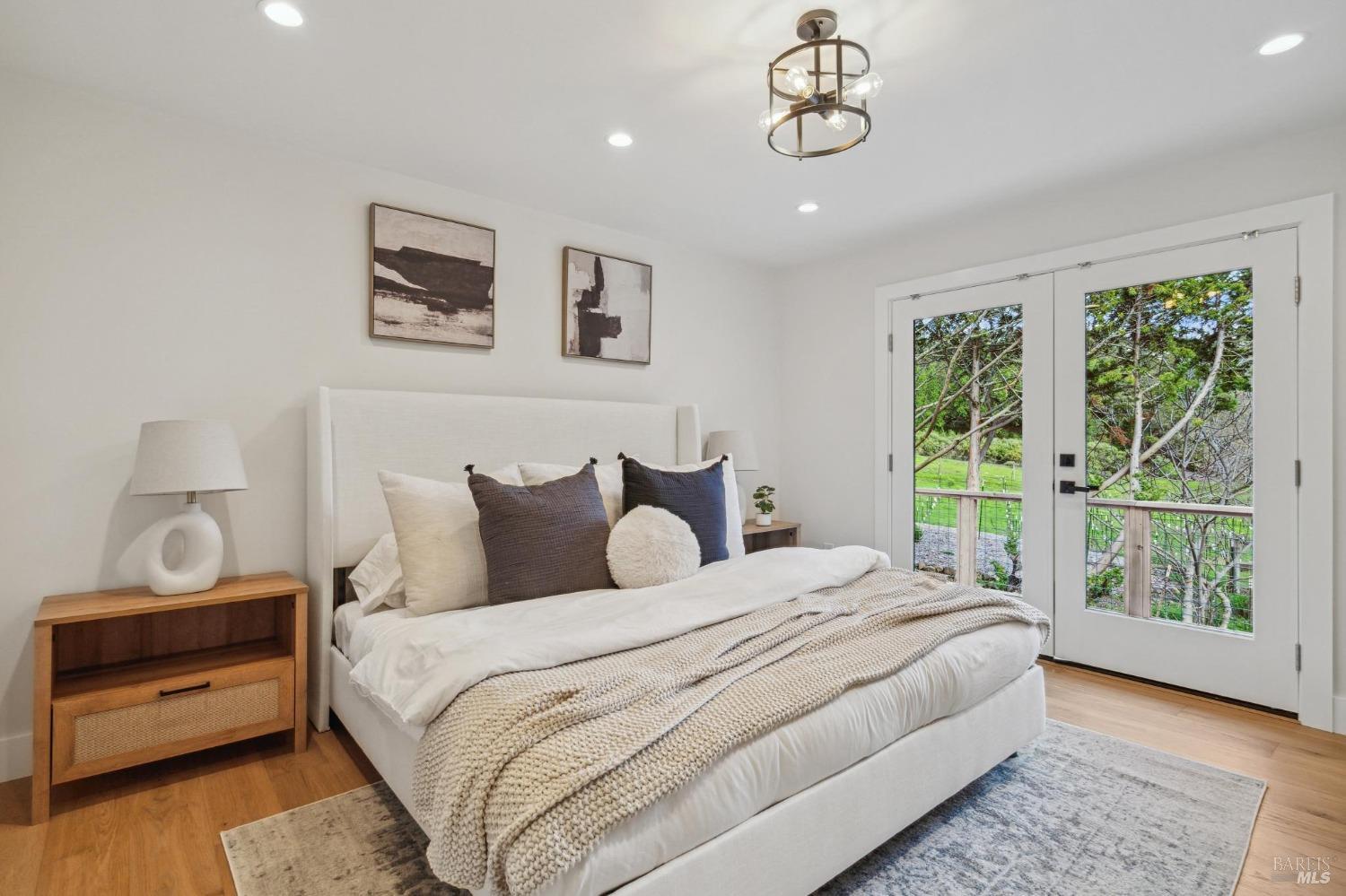 19129-19131 Spring Drive Sonoma, CA 95476 - Photo 11 of 29 a bedroom with bed and window