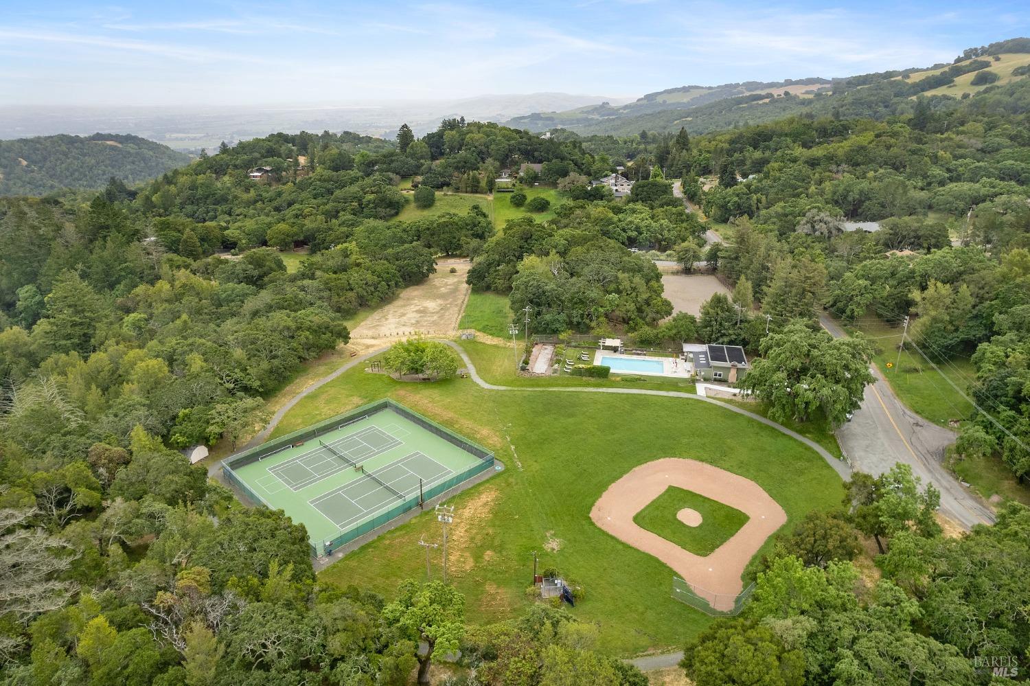 19129-19131 Spring Drive Sonoma, CA 95476 - Photo 26 of 29 a view of a golf course with golf course