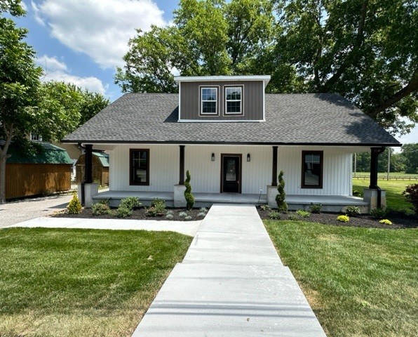 10267 Viola Road Morrison, TN 37357 - Photo 1 of 34 a front view of a house with a yard and trees