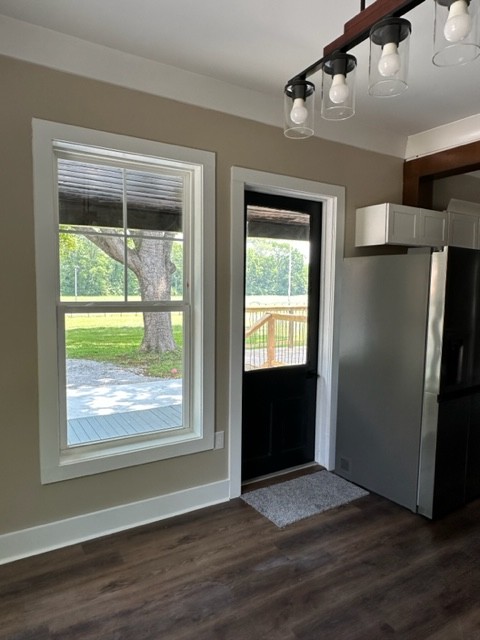 10267 Viola Road Morrison, TN 37357 - Photo 20 of 34 a view of an empty room with wooden floor and a window