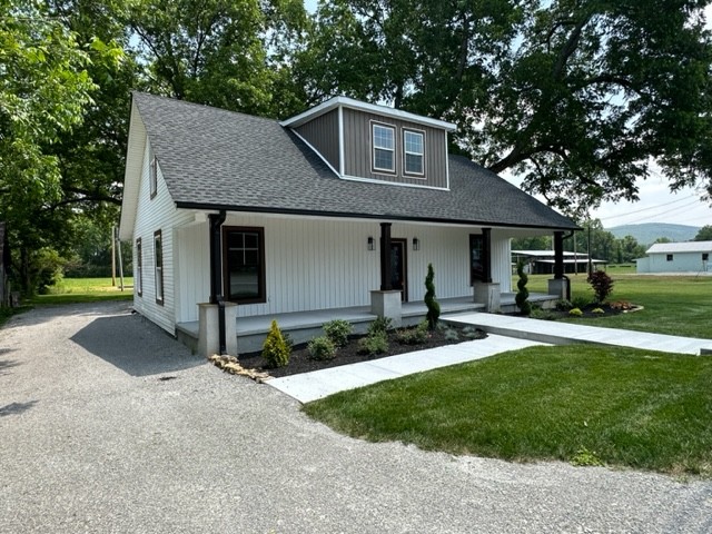 10267 Viola Road Morrison, TN 37357 - Photo 2 of 34 a front view of a house with a yard