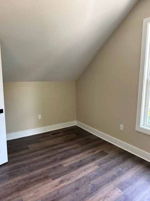 10267 Viola Road Morrison, TN 37357 - Photo 23 of 34 a view of an empty room and wooden floor and a window