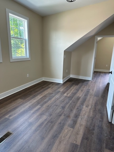10267 Viola Road Morrison, TN 37357 - Photo 26 of 34 a view of an empty room with wooden floor and a window